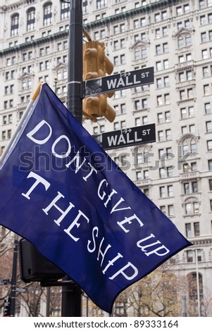 NEW YORK - NOV 17: A close up of a banner that reads \'Don\'t Give Up The Ship\' on Broadway and Wall Streets mid-morning on OWS  \'Day of Disruption\' on November 17, 2011 in New York City, NY.