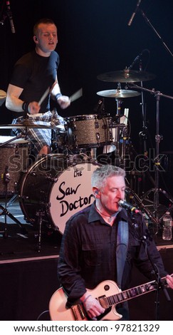 NEW YORK - MAR 16:  Singer / guitarist Davy Carton and drummer Rickie O\'Neill of the Saw Doctors perform at Irving Plaza on March 16, 2012 in New York City.