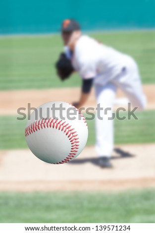 Baseball pitcher throwing the ball right at you