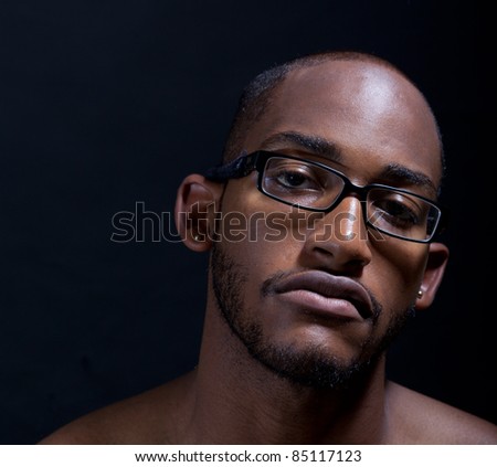 Hip muscular black man in sunglasses
