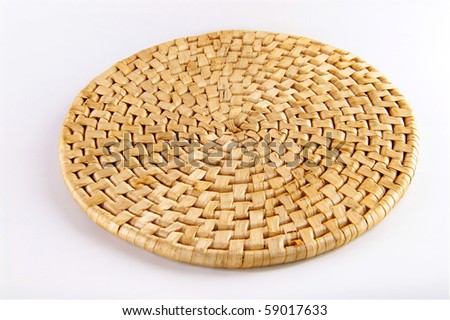 Bamboo place mat isolated on white. Concept of eco friendly household item.