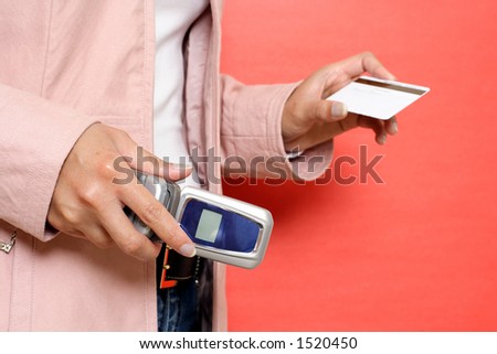 A woman calling credit card company before shopping