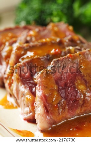 Slices of tender beef served with peanut sauce