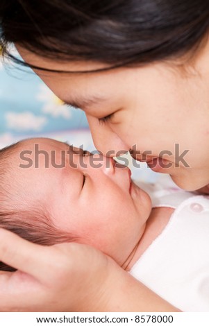 black and asian mixed baby. stock photo : An asian mother
