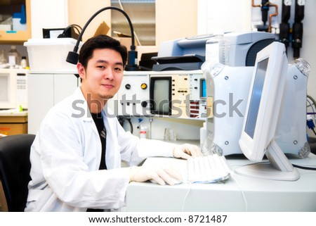 A shot of a scientist working on a computer in a laboratory