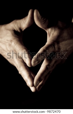 A closeup shot of hands of an old man