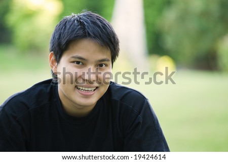 A headshot of an asian college student