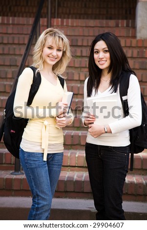 A shot of two college students meeting on campus