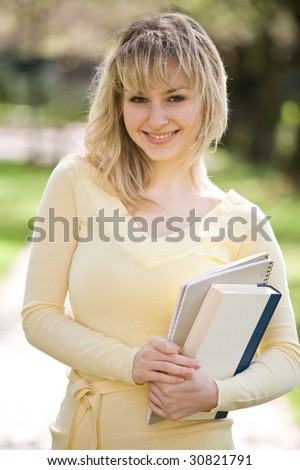 A shot of a beautiful caucasian college student on campus