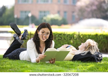 A shot of two college students studying on campus