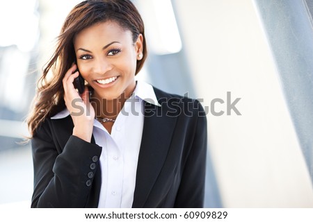 A shot of a beautiful black businesswoman on the phone