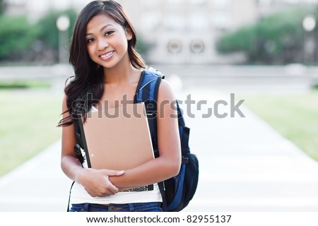 A portrait of an Asian college student at campus