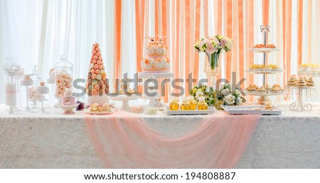 wedding sweet dessert Fondant Cake and  Macarons  gift table in