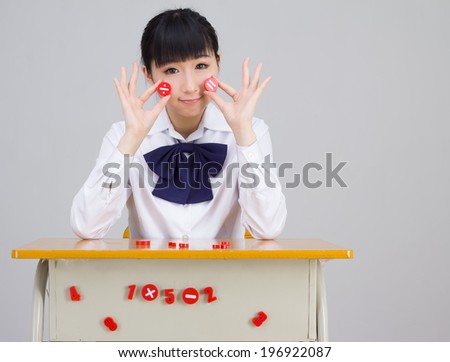 asian girl student in school uniform math