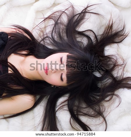 young girl with black hair / sleeping beauty / asia japanese