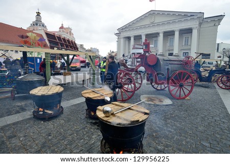 VILNIUS, LITHUANIA - MARCH 1: Unidentified people trades food in annual traditional crafts fair - Kaziuko fair on Mar 1, 2013 in Vilnius, Lithuania