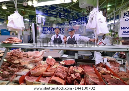 Birmingham, England - June 13: Unknown Man Trades A Meat In Bull Ring Market On June 13, 2013 In Birmingham, England. Birmingham'S Indoor Bull Ring Market Sees Over Six Million Shoppers Every Year