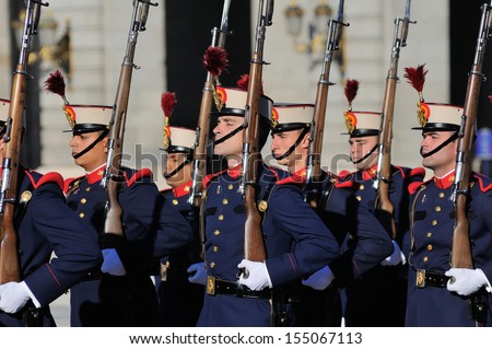 MADRID, SPAIN - OCTOBER 25: Royal Guards participate in the Changing of the Guards outside Madrid\'s Royal Palace on October 25, 2010 in Madrid, capital of Spain.
