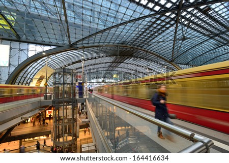 BERLIN - NOVEMBER 23: Berlin Central train station on 23 November 2013 in Berlin, Germany. 1,800 trains call at the station per day and the daily number of passengers is estimated to be at 350,000