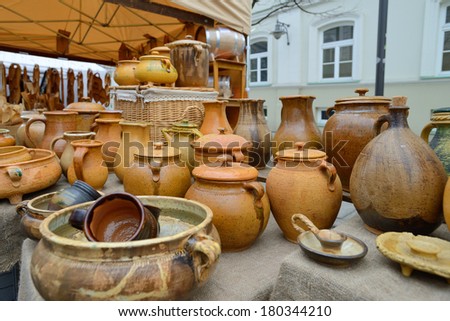 VILNIUS, LITHUANIA - MARCH 7: Typical lithuanian pots in annual traditional crafts fair - Kaziuko fair on Mar 7, 2014 in Vilnius, Lithuania