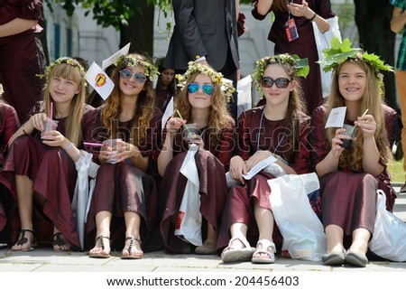 VILNIUS, LITHUANIA - JULY 6: Unidentified peoples in traditional Lithuanian Song Celebration on July 6, 2014 in Vilnius, Lithuania. Song Festival is Lithuania\'s main cultural event for 2014.