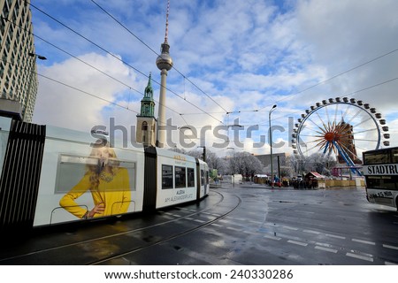 BERLIN - DECEMBER 26: traffic near Alexanderplatz on December 26, 2014 in Berlin, Germany. The tram in Berlin is one of the oldest tram systems in the world.