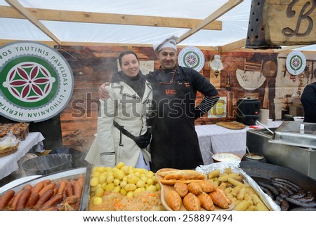 VILNIUS, LITHUANIA - MARCH 7: Unidentified people trade food in annual traditional crafts fair - Kaziuko fair on Mar 7, 2015 in Vilnius, Lithuania