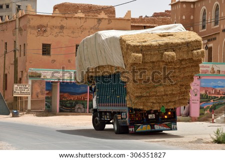 MOROCCO - AUGUST 02: Overloaded truck staying on road, August 02, 2015 in Atlas Mountains, Morocco. Road in Atlas Mountains very popular tourist route in central Morocco.