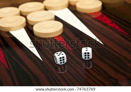 Backgammon table and dice closeup