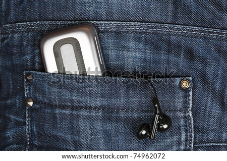 Closeup to jeans pocket with phone