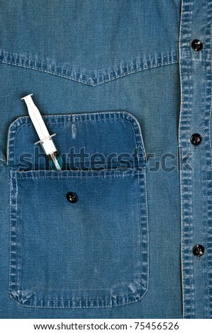 Jeans shirt pocket with syringe