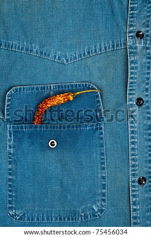 Jeans shirt pocket with dry pepper