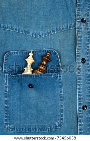 Jeans shirt pocket with chess pieces