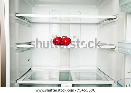 Refrigerator close up with tomatoes