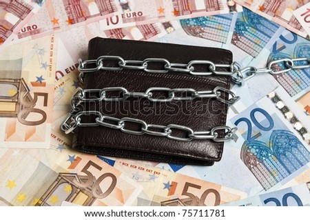 Leather wallet locked with chain