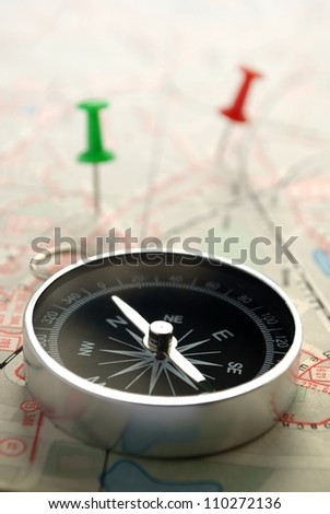 compass map and pushpin on the table compass map and pushpin on the table