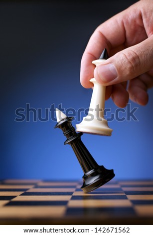 game of chess white king affects black king chess player and the visible hand