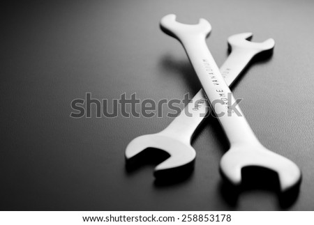 Close up Open Ended Wrenches hand Tools on a Gray Background with Copy Space on the Left Side.