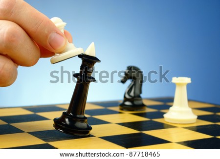 board game of chess, chess pieces on a blue background