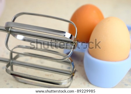 blender and eggs on the kitchen table