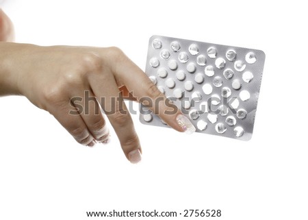 woman hand with half empty pill package
