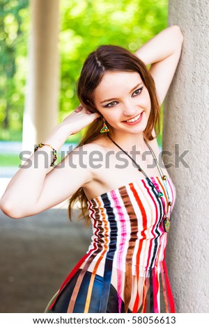 model, beautiful happy girl,  outdoor, sunny clear day fashion jewelry