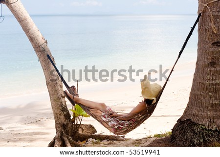 woman hammock sleep on the beach in thailand.