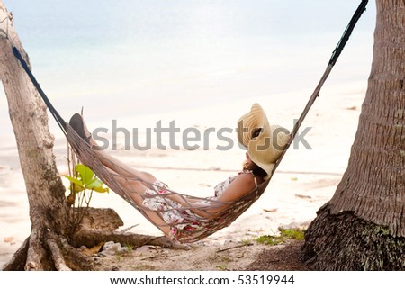 woman hammock sleep on the beach in thailand.