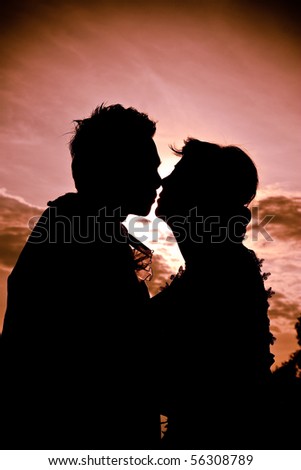 Wedding couple kiss silhouette.