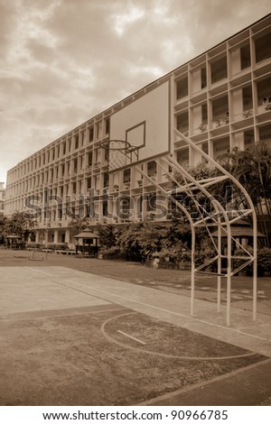 Old school ,Building school and basketball hoop.
