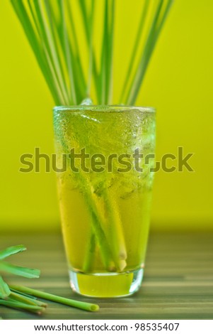 Herb drink lemon grass on yellow background.