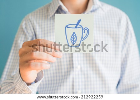 Picture icon mug and spoon in hand