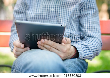 businessman using touch pad of tablet pc