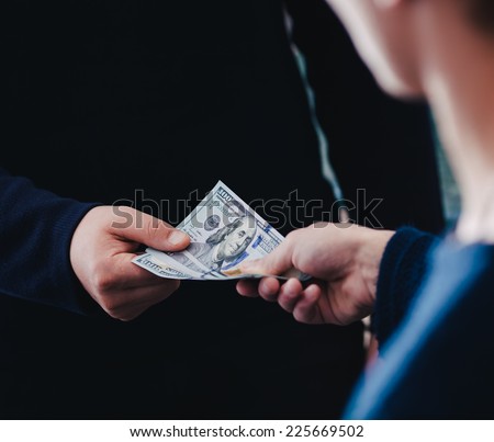Transfer of money from hand to hand
